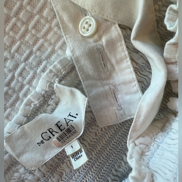 THE GREAT. The Clover Smocking Sleeveless Embroidered Floral Mid Dress - Picture 16 of 16